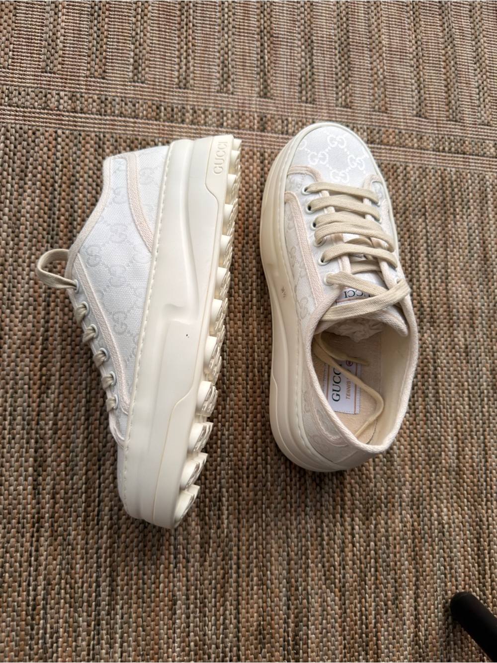 Gucci Cream/white GG Canvas Low-Top Sneakers on a platform